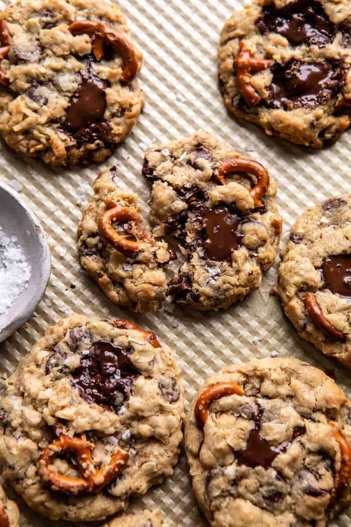 Salted Pretzel Cowboy Party Cookies | halfbakedharvest.com #cookies #chocolate overhead photo of Salted Pretzel Cowboy Party Cookies on baking sheet