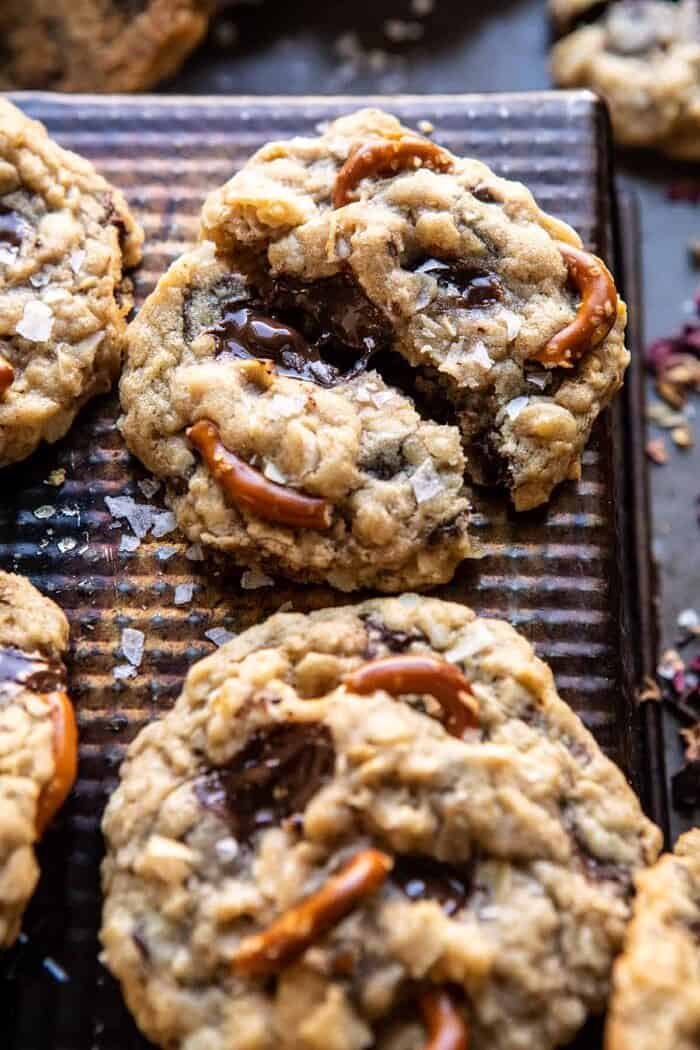 Salted Pretzel Cowboy Party Cookies | halfbakedharvest.com #cookies #chocolate side angled close up photo of Salted Pretzel Cowboy Party Cookies