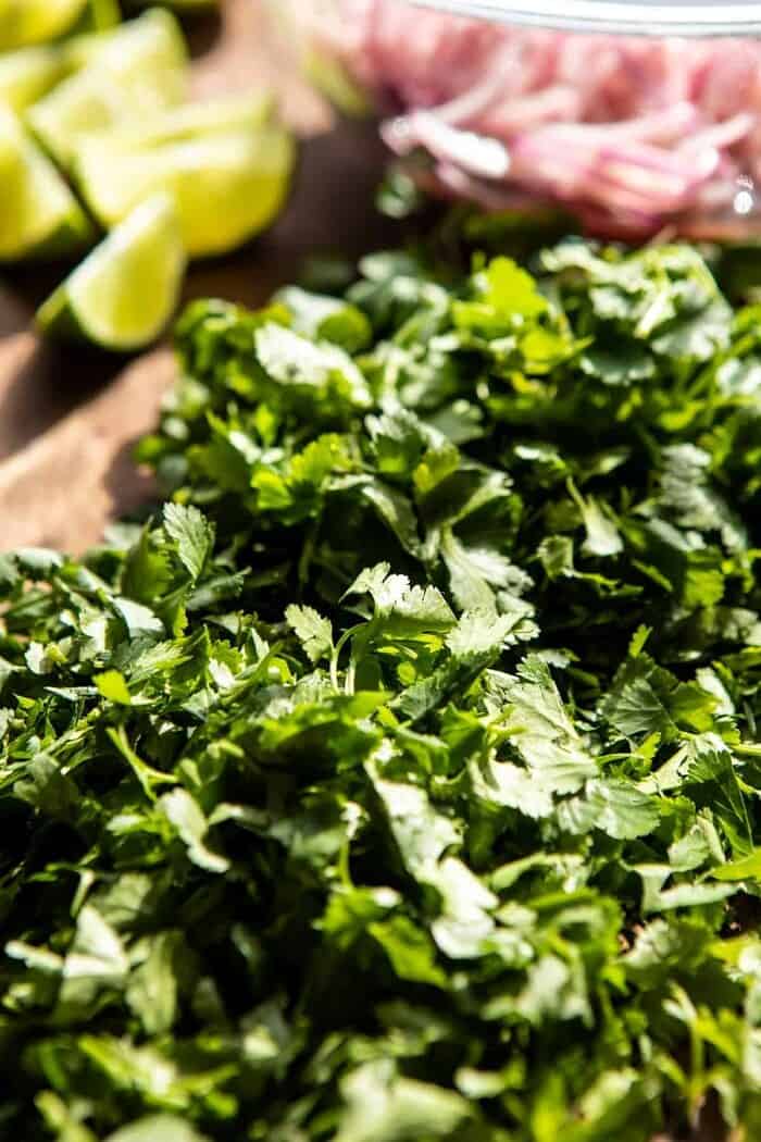 Crispy Chipotle Chicken Tacos with Cilantro Lime Ranch | halfbakedharvest.com photo of raw cilantro