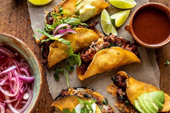 Crispy Chipotle Chicken Tacos with Cilantro Lime Ranch | halfbakedharvest.com horizontal overhead photo of Crispy Chipotle Chicken Tacos
