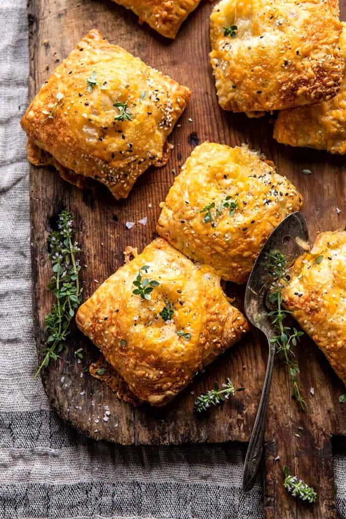 Flaky Broccoli Cheddar Soup Mini Pies | halfbakedharvest.com overhead photo of Flaky Broccoli Cheddar Soup Mini Pies