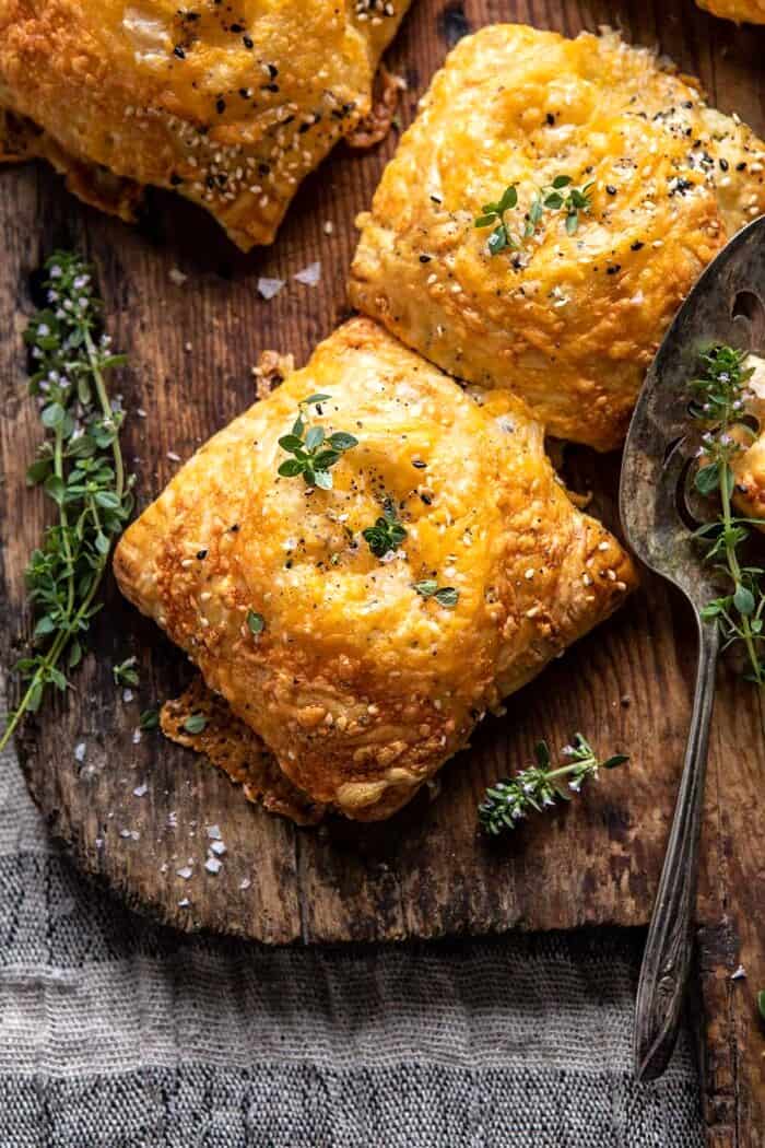 Flaky Broccoli Cheddar Soup Mini Pies | halfbakedharvest.com overhead close up photo of Flaky Broccoli Cheddar Soup Mini Pies