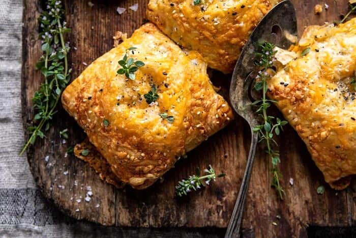 Flaky Broccoli Cheddar Soup Mini Pies | halfbakedharvest.com overhead horizontal close up photo of Flaky Broccoli Cheddar Soup Mini Pies