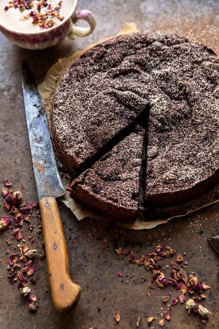overhead photo of Flourless Chocolate Espresso Cake with 1 slice cut