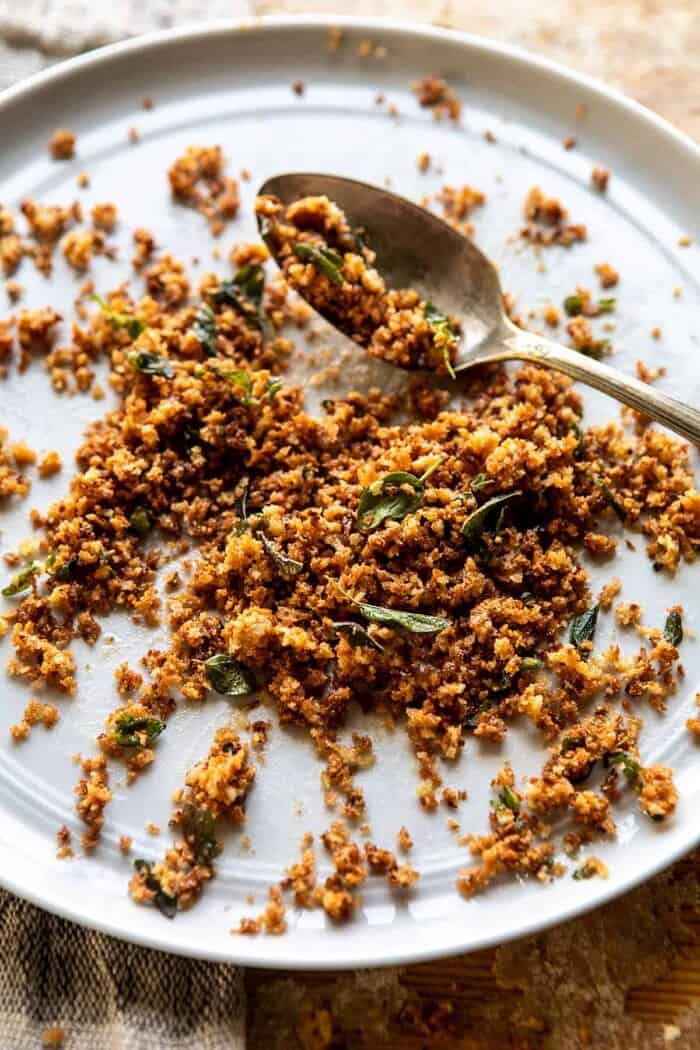 Roasted Red Pepper Alla Vodka Pasta with Cheesy Oregano Breadcrumbs | halfbakedharvest.com Cheesy Oregano Breadcrumbs on plate