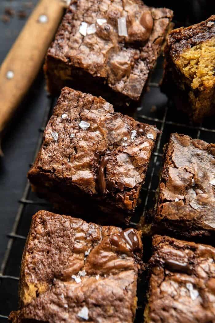Salted Cookie Crinkle Top Brownies | halfbakedharvest.com side angle close up photo of Salted Cookie Crinkle Top Brownies
