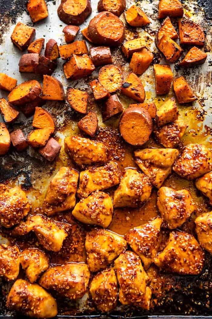 Sheet Pan Korean Chicken Bowl with Sweet Potatoes and Yum Yum Sauce | halfbakedharvest.com #sheetpan #korean overhead photo of Sheet Pan Korean Chicken with Sweet Potatoes on sheet pan
