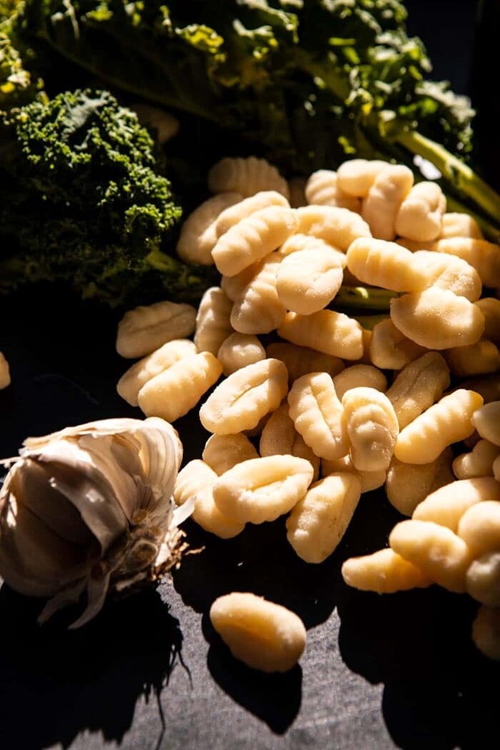Skillet Baked Creamy Pesto Spinach and Artichoke Gnocchi | halfbakedharvest.com #gnocchi #easyrecipes #oneskillet photo of dry gnocchi before cooking