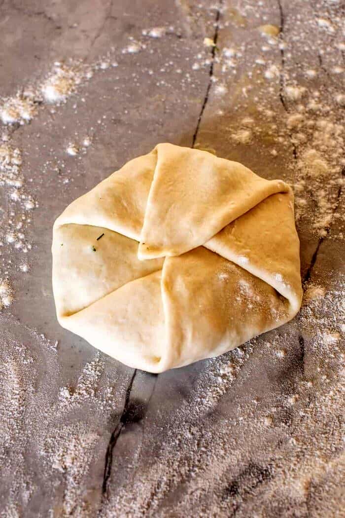 Cheesy Herb Stuffed Naan | halfbakedharvest.com prep photo of Cheesy Herb Stuffed Naan before baking