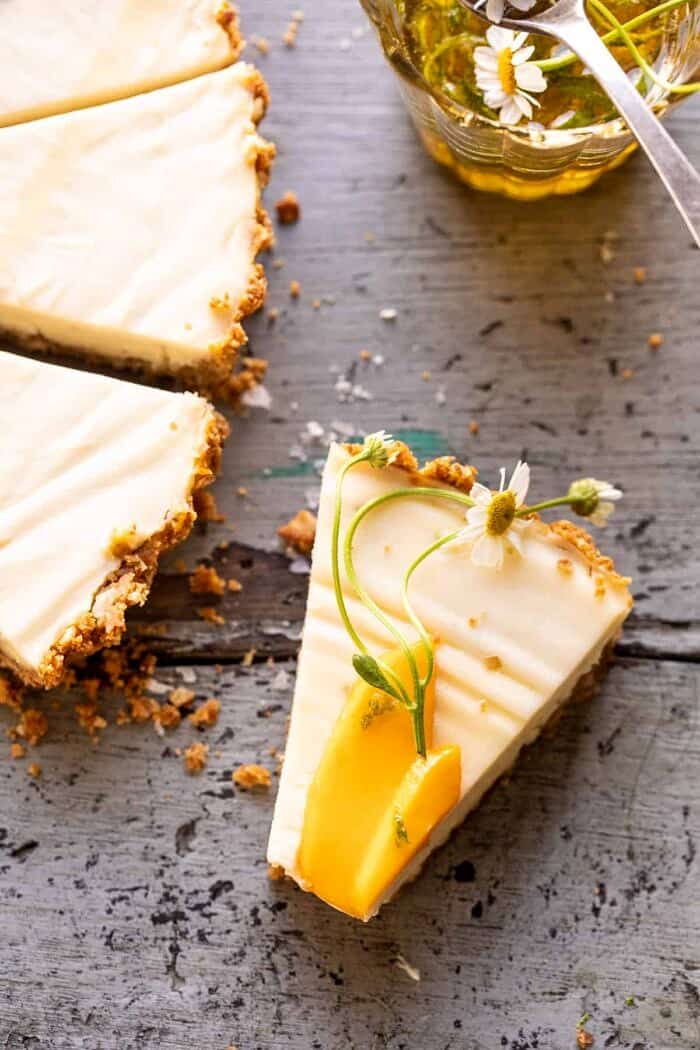 overhead close up photo of No Fuss Coconut Lime Tart slice with a bite taken out of the slice