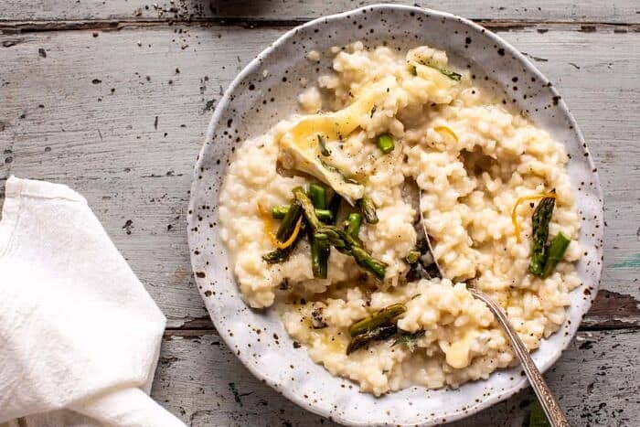 overhead horizontal photo of No Stir Brie Risotto with Lemon Butter Asparagus