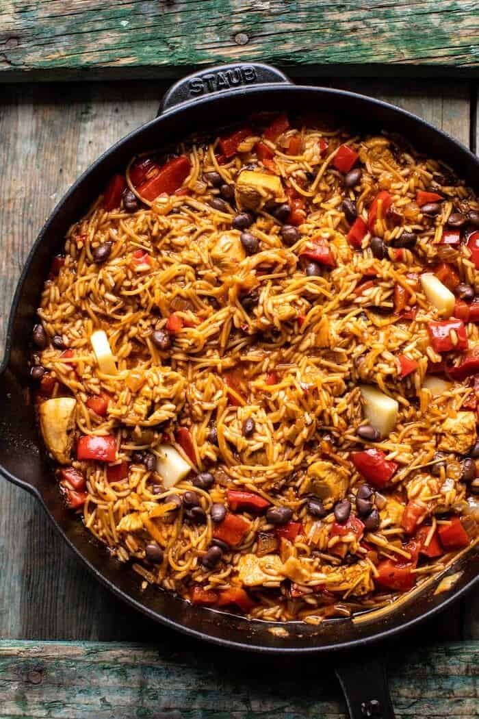 One Skillet Cheesy Cuban Chicken Rice Bake | halfbakedharvest.com prep photo of One Skillet Cheesy Cuban Chicken Rice before adding cheese and before baking