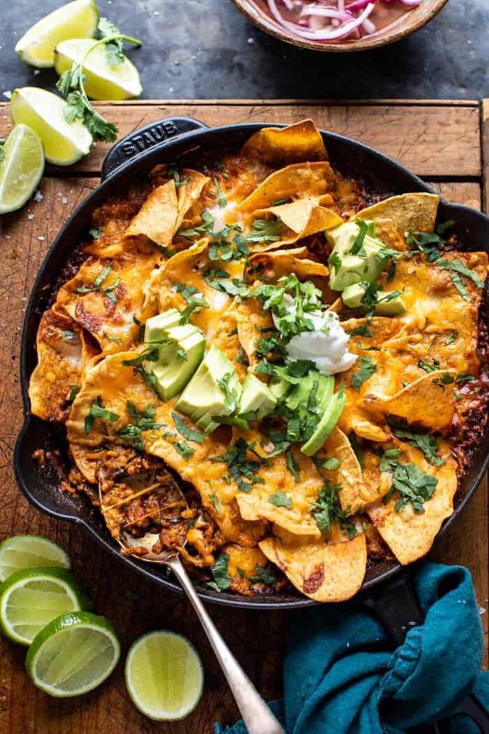 One Skillet Saucy Chicken Tortilla Enchilada Rice Bake | halfbakedharvest.com