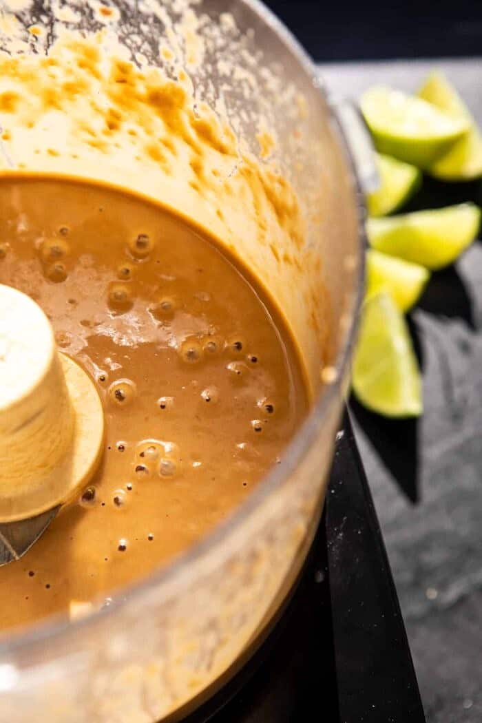 Saucy Tahini Noodles with Honey'd Sweet Potatoes | halfbakedharvest.com prep photo of tahini sauce in bowl