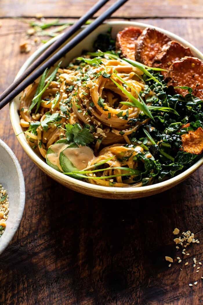 Saucy Tahini Noodles with Honey'd Sweet Potatoes | halfbakedharvest.com side angled photo of Saucy Tahini Noodles with Honey'd Sweet Potatoes