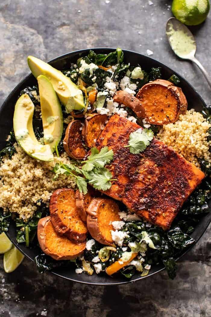 overhead close up photo of Sheet Pan Chipotle Salmon with Cilantro Lime Special Sauce | halfbakedharvest.com