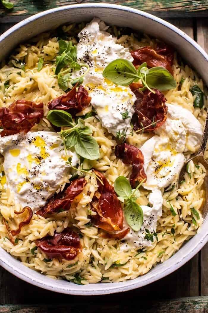 overhead close up photo of 20 Minute Orzo Carbonara with Crispy Prosciutto and Burrata