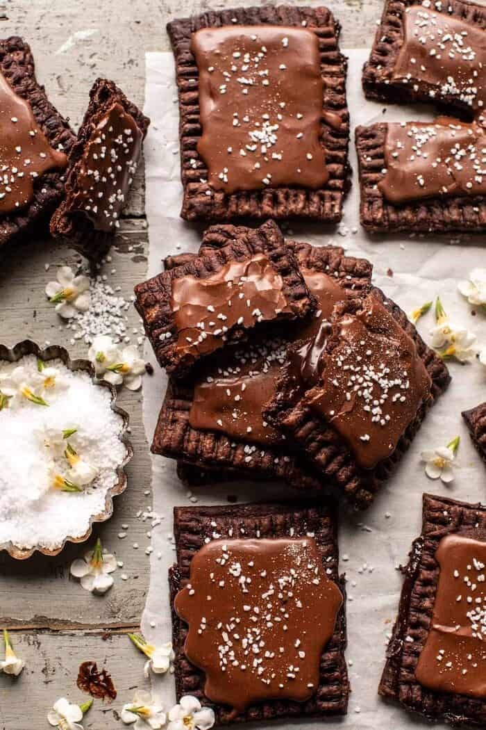Homemade Chocolate Fudge Pop Tarts | halfbakedharvest.com overhead photo of Homemade Chocolate Fudge Pop Tarts with center tart broken in half