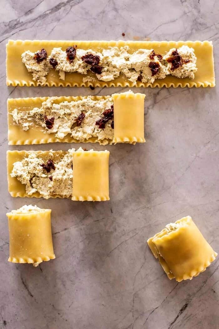 prep photo of rolling the Lasagna Rolls up with cheese