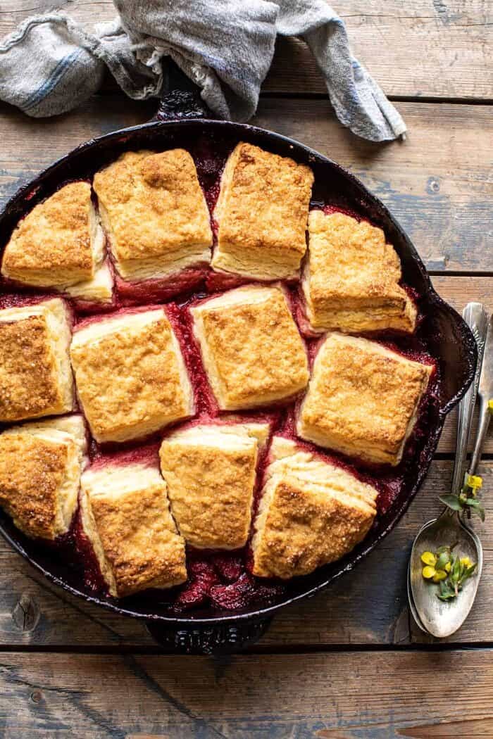 Skillet Strawberry Bourbon Cobbler with Layered Cream Cheese Biscuits | halfbakedharvest.com overhead photo of Skillet Strawberry Bourbon Cobbler with Layered Cream Cheese Biscuits