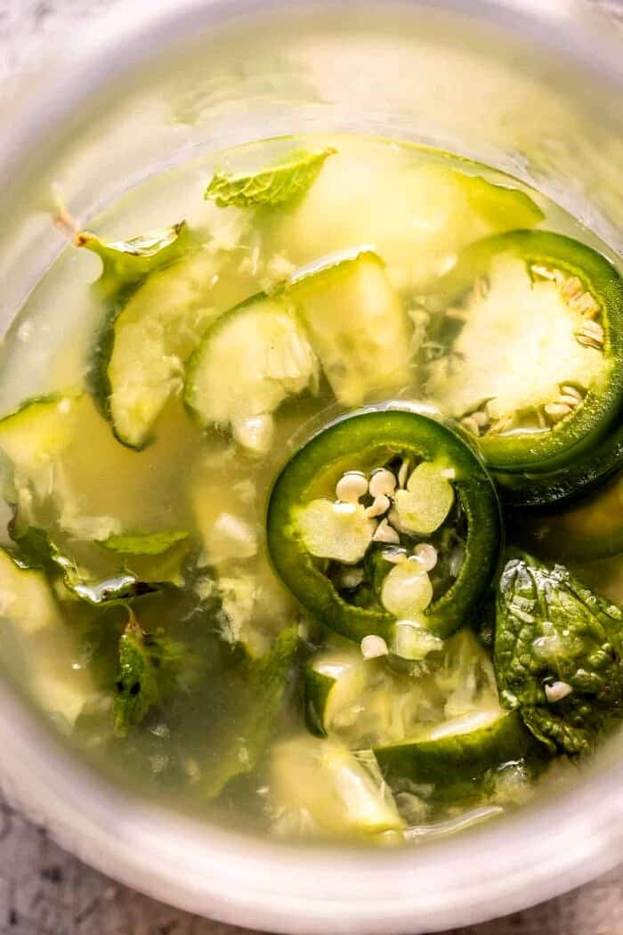 Spicy Cucumber Margarita | halfbakedharvest.com overhead prep photo of Spicy Cucumber Margarita being mixed in cocktail shaker