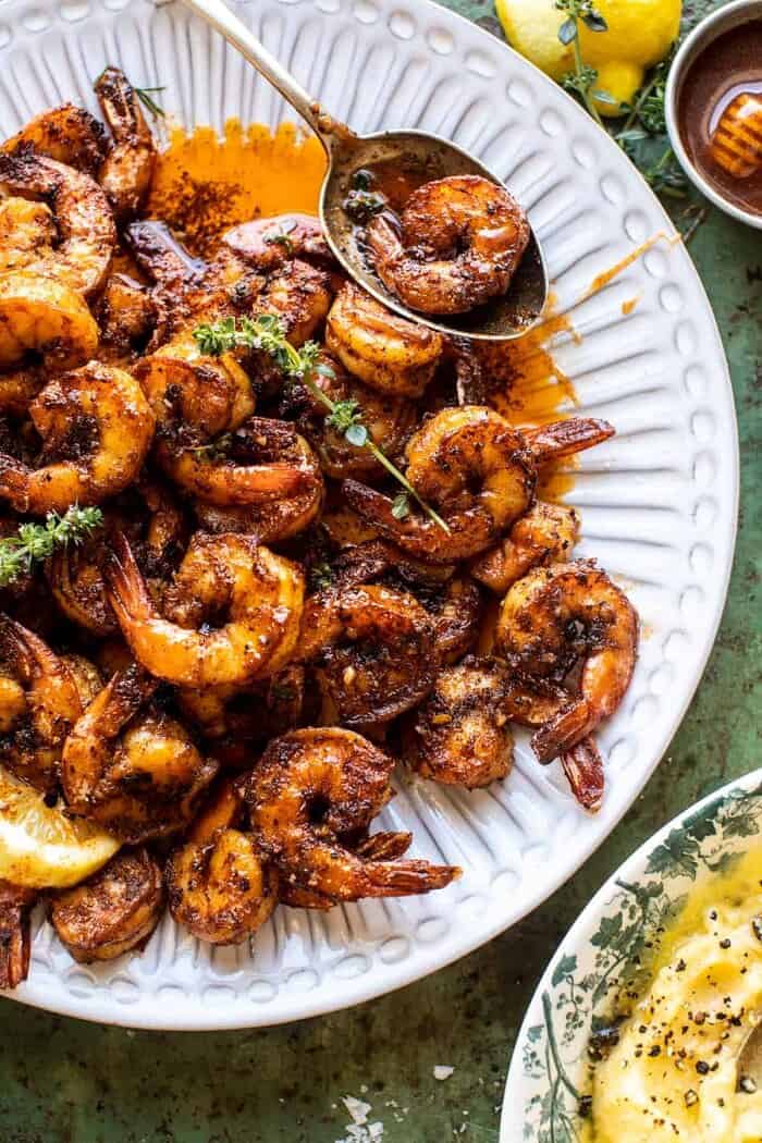 15 Minute Cajun Hot Honey Butter Shrimp | halfbakedharvest.com overhead close up photo of 15 Minute Cajun Hot Honey Butter Shrimp on serving plate