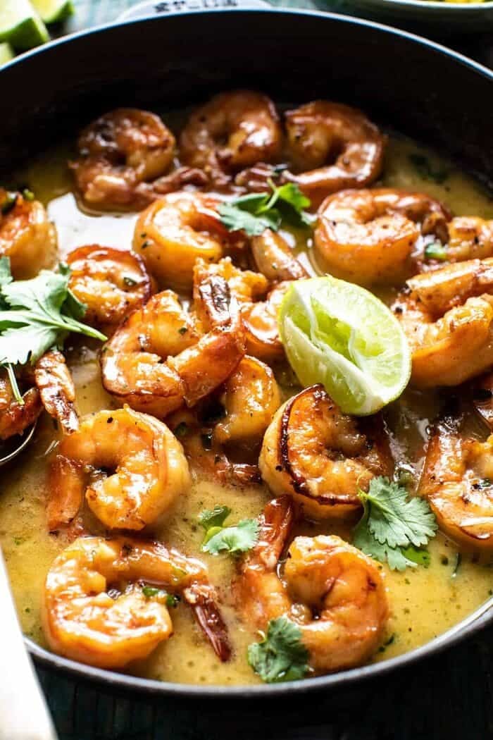 20 Minute Honey Garlic Butter Shrimp | halfbakedharvest.com side angled close up photo of 20 Minute Honey Garlic Butter Shrimp in skillet