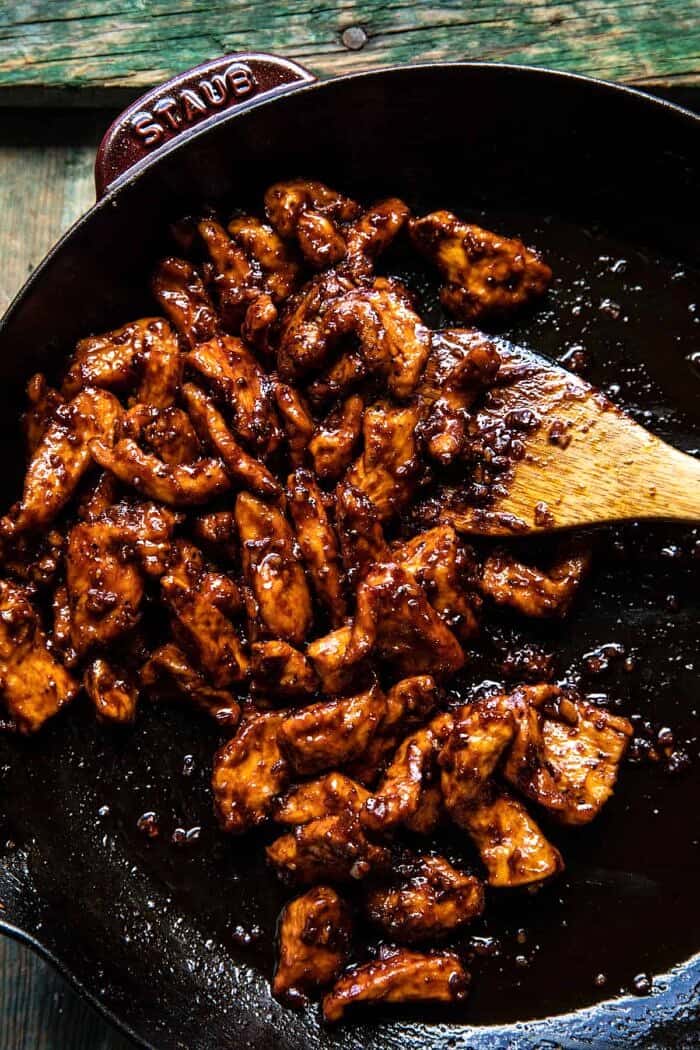 25 Minute Korean Bulgogi BBQ Chicken with Spicy Garlic Butter Corn | halfbakedharvest.com overhead photo of 25 Minute Korean Bulgogi BBQ Chicken in skillet after cooking