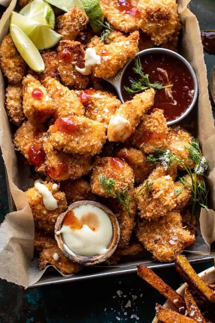 Coconut Popcorn Chicken with Sweet Thai Chili Lime Sauce | halfbakedharvest.com overhead close up photo of Coconut Popcorn Chicken with Sweet Thai Chili Lime Sauce