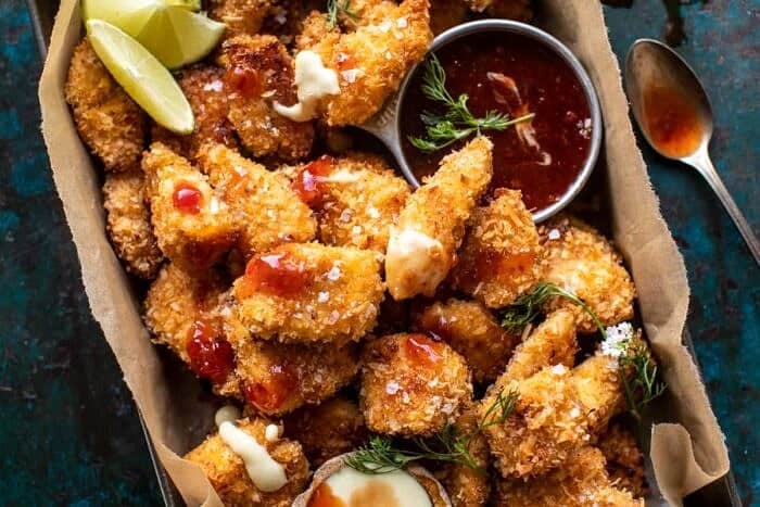 Coconut Popcorn Chicken with Sweet Thai Chili Lime Sauce | halfbakedharvest.com overhead horizontal photo of Coconut Popcorn Chicken with Sweet Thai Chili Lime Sauce