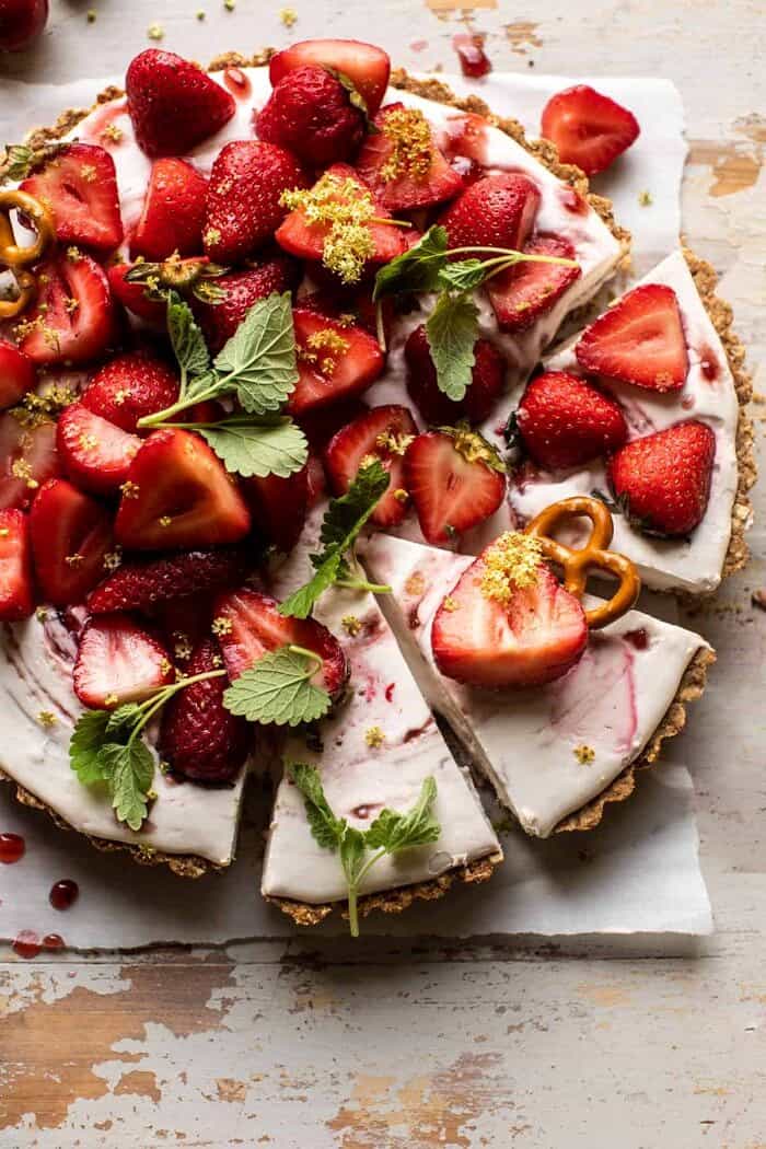 overhead photo of Double Strawberry Pretzel Pie with 3 slices cut
