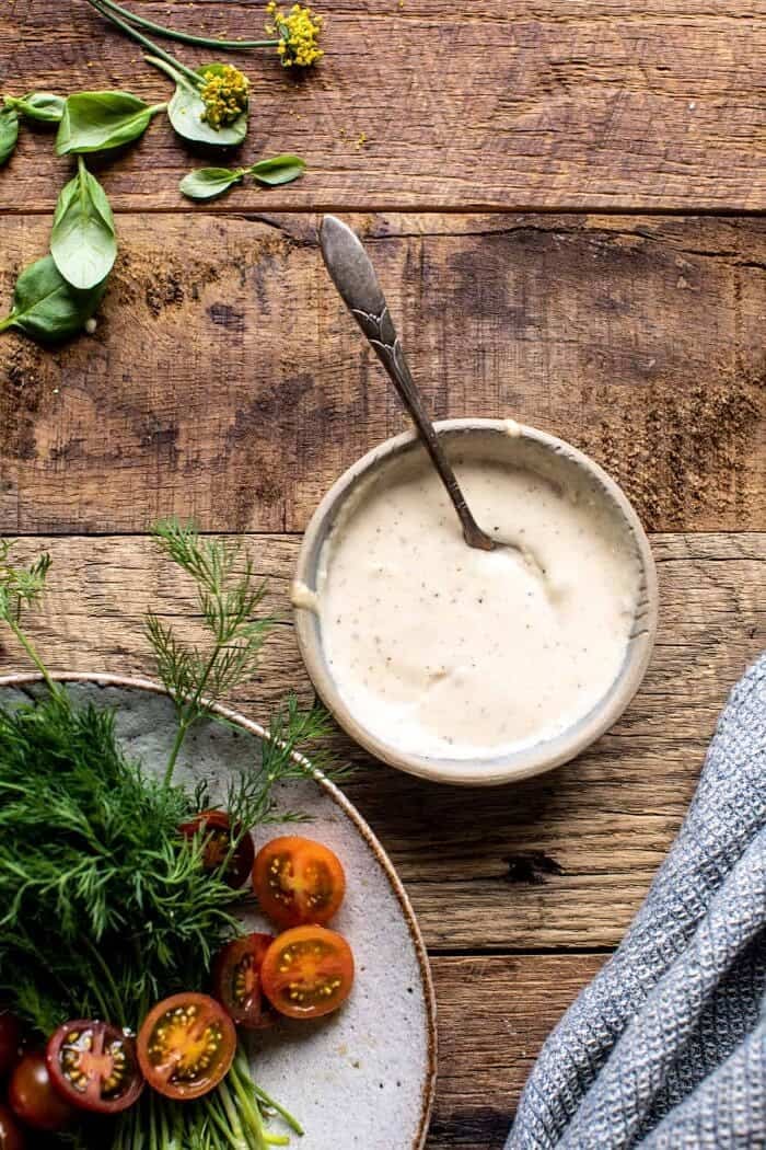 Greek Chicken Chopped Salad with Lemon Tahini Vinaigrette | halfbakedharvest.com overhead prep photo of Lemon Tahini Vinaigrette