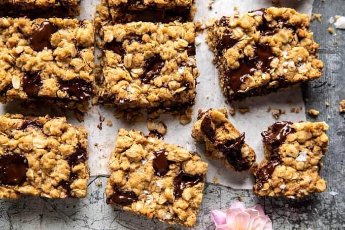 Healthier Dark Chocolate Chunk Oatmeal Cookie Bars | halfbakedharvest.com overhead horizontal photo of Healthier Dark Chocolate Chunk Oatmeal Cookie Bars
