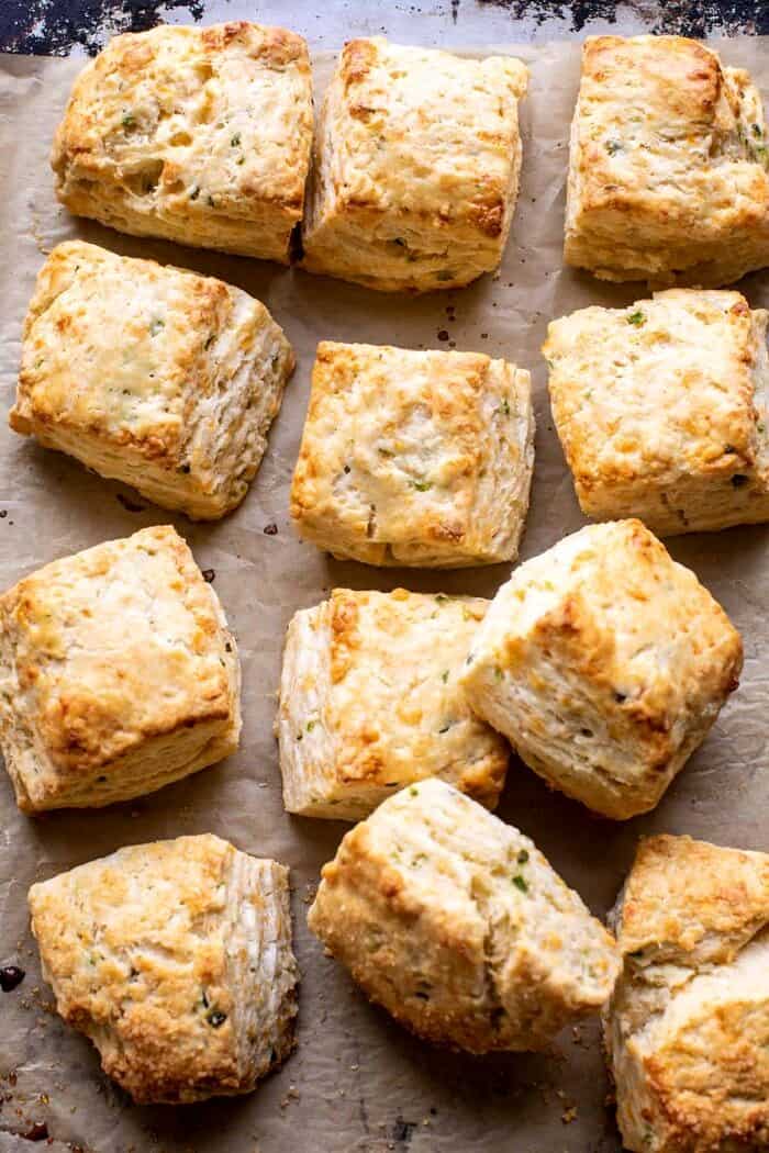 Layered Jalapeño Cheddar Biscuits with Salted Honey Butter | halfbakedharvest.com overhead photo of Layered Jalapeño Cheddar Biscuits on baking sheet