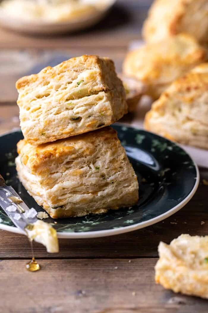 Layered Jalapeño Cheddar Biscuits with Salted Honey Butter | halfbakedharvest.com side photo of Layered Jalapeño Cheddar Biscuits with Salted Honey Butter