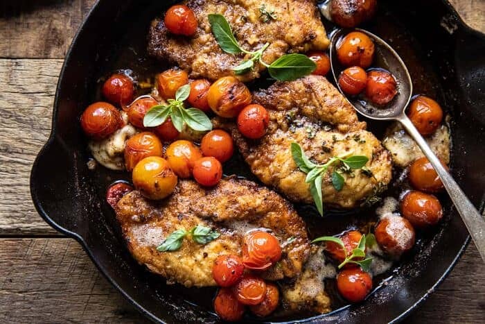 20 Minute Florentine Butter Chicken with Burst Cherry Tomatoes | halfbakedharvest.com overhead horizontal photo of 20 Minute Florentine Butter Chicken with Burst Cherry Tomatoes