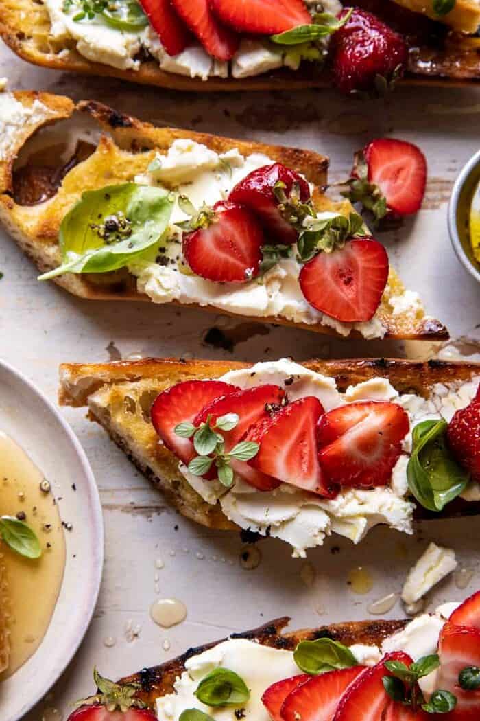 overhead close up photo of Marinated Goat Cheese Strawberry Crostini