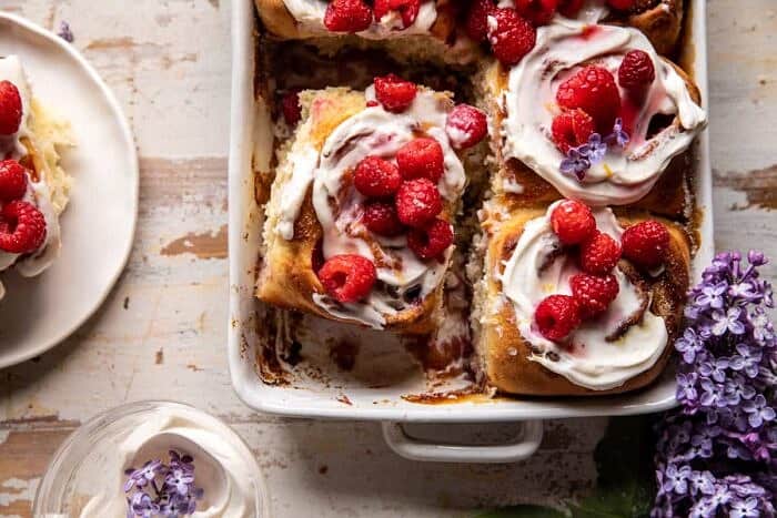 Raspberry Lemon Brioche Rolls with Whipped Ricotta Cream | halfbakedharvest.com overhead close up horizontal photo of Raspberry Lemon Brioche Rolls with Whipped Ricotta Cream