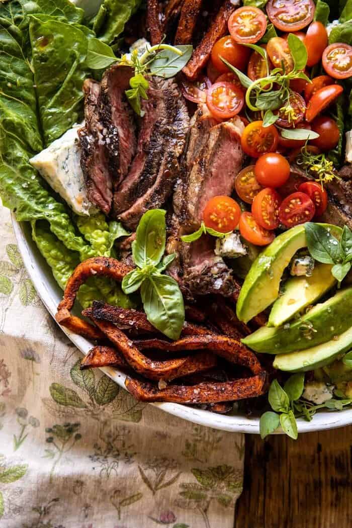 Sweet Potato Fry Steak Salad with Blue Cheese Butter | halfbakedharvest.com overhead close up photo of Sweet Potato Fry Steak Salad with Blue Cheese Butter