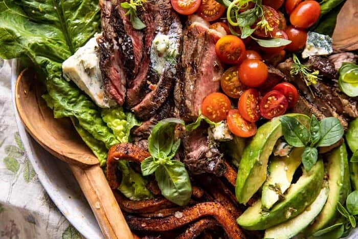 Sweet Potato Fry Steak Salad with Blue Cheese Butter | halfbakedharvest.com overhead horizontal photo of Sweet Potato Fry Steak Salad with Blue Cheese Butter