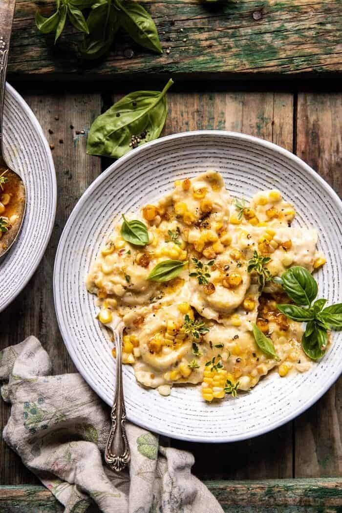 Browned Garlic Butter Creamed Corn Cheese Ravioli | halfbakedharvest.com overhead photo of Browned Garlic Butter Creamed Corn Cheese Ravioli in pasta bowl with fork