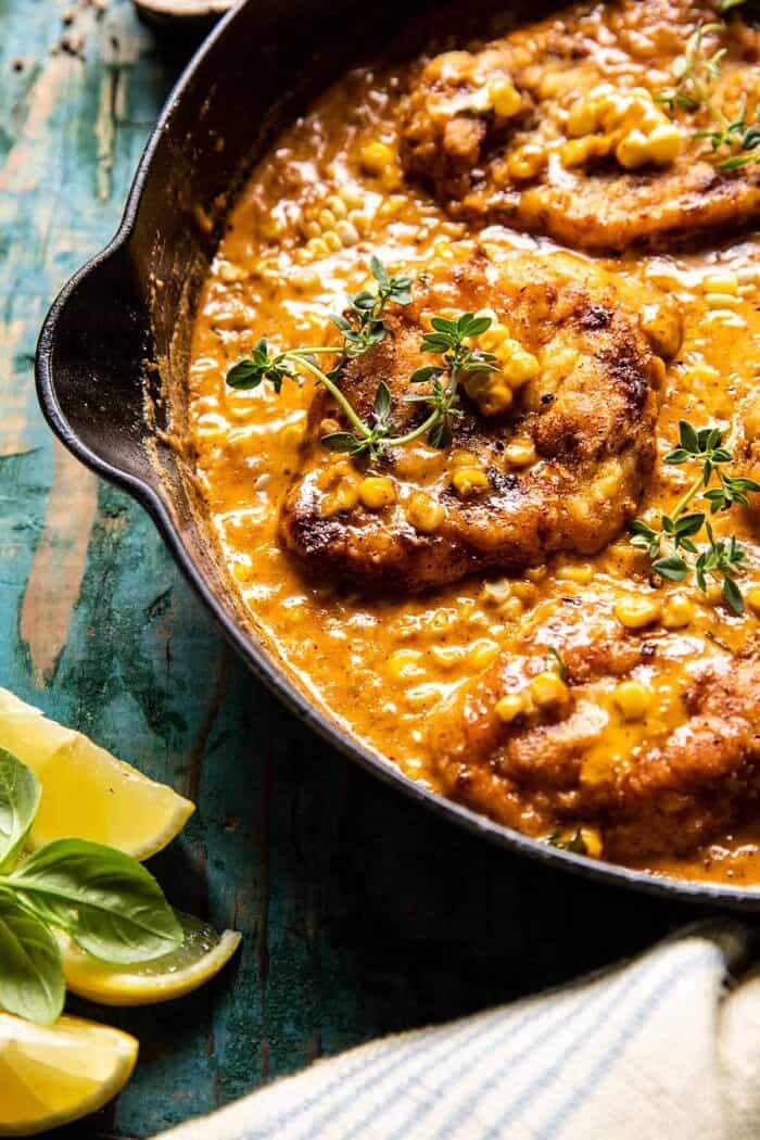 Creamy Cajun Skillet Chicken Lazone with Herby Corn | halfbakedharvest.com side photo of Creamy Cajun Skillet Chicken Lazone with Herby Corn