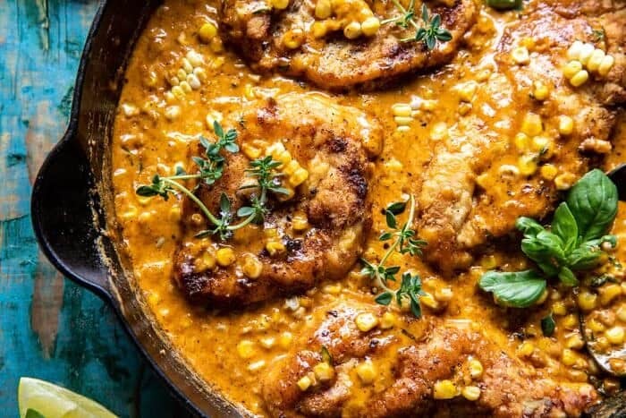 Creamy Cajun Skillet Chicken Lazone with Herby Corn | halfbakedharvest.com overhead horizontal photo of Creamy Cajun Skillet Chicken Lazone with Herby Corn