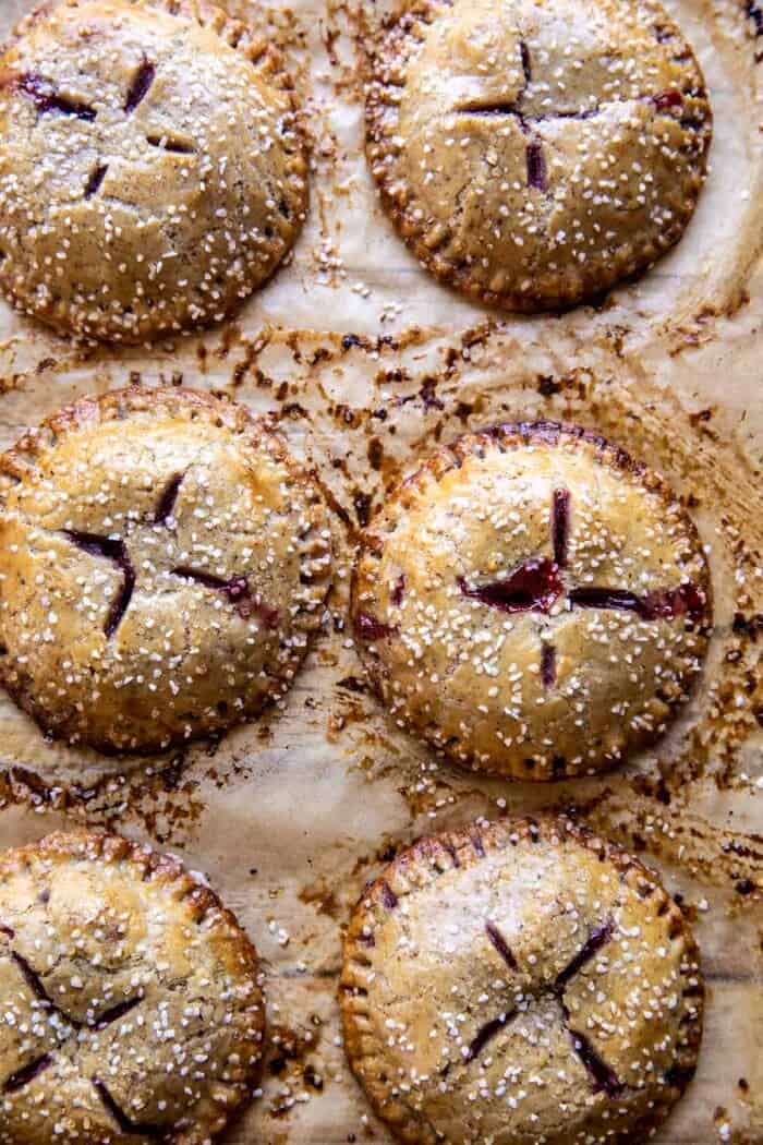 Jammy Raspberry Cream Pretzel Hand Pies after baking on baking sheet