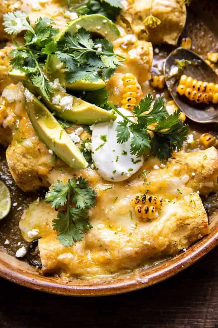 overhead close up photo of Sheet Pan Chipotle Cheddar Corn Chicken Enchiladas