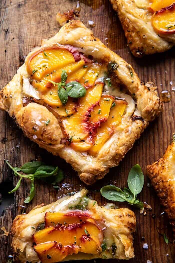 Peach Brie Pastry Tarts with Peppered Rosemary Honey | halfbakedharvest.com overhead photo of Peach Brie Pastry Tarts with Peppered Rosemary Honey