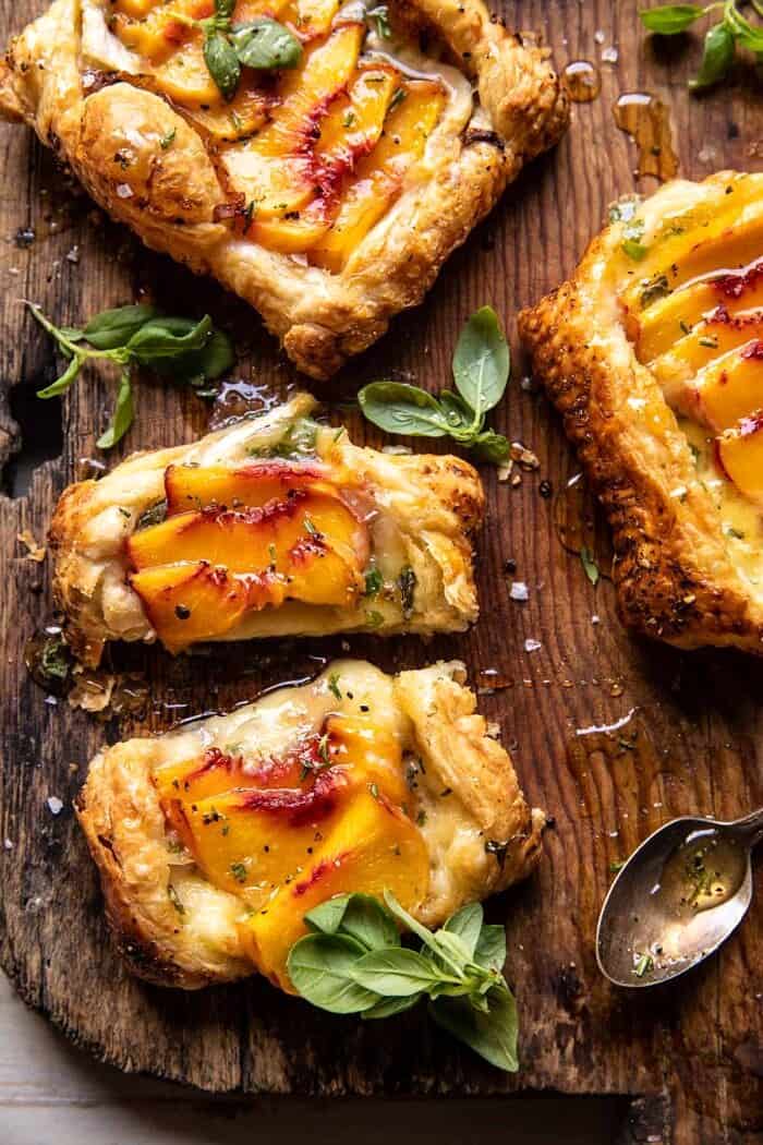 Peach Brie Pastry Tarts with Peppered Rosemary Honey | halfbakedharvest.com overhead photo of Peach Brie Pastry Tarts with Peppered Rosemary Honey
