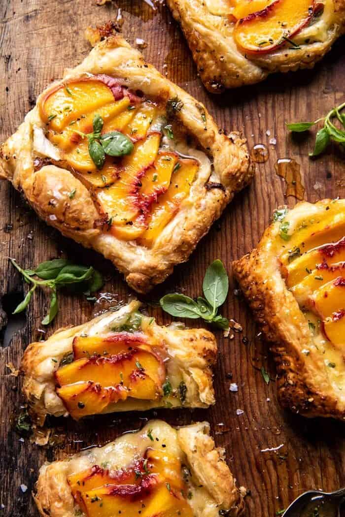 Peach Brie Pastry Tarts with Peppered Rosemary Honey | halfbakedharvest.com overhead photo of Peach Brie Pastry Tarts with Peppered Rosemary Honey