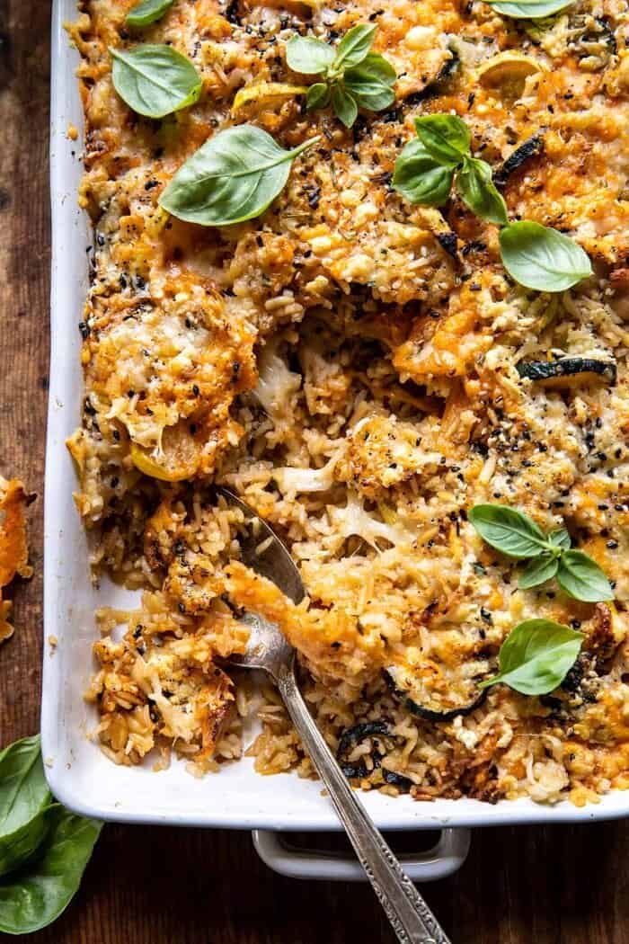overhead close up photo of Cheesy Zucchini Chicken and Rice Bake 