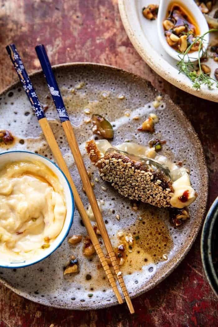 Crispy Sesame Ginger Potstickers with Chive Chili Sauce | halfbakedharvest.com overhead photo of Crispy Sesame Ginger Potstickers with Chive Chili Sauce